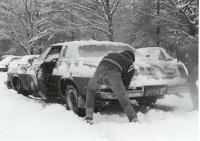 Clearing snow off car