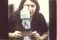 Student with a Microscope
